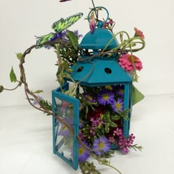 Sue Hines Floral - Repurposed lantern made a cute summer centerpiece.