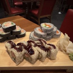 Lobster roll (top left), house roll (top right), and spicy tuna crunch roll (bottom) Lobster roll (top left), house roll (top right), and spicy tuna crunch roll (bottom)