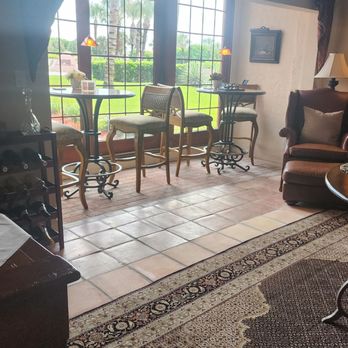The Inn At Cocoa Beach - Have a beverage inside looking out at the pool - Hotels Near Me - Cocoa Beach, Florida