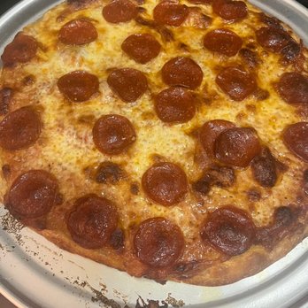 Nadi Plates - Pepperoni pizza after 17 minutes in the oven. - Food Trucks Near Me