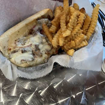 Middle Sound Grille - Cheesesteak sandwich and fries - Salad Near Me - Wilmington, North Carolina Middle Sound Grille - Cheesesteak sandwich and fries - Salad Near Me - Wilmington, North Carolina