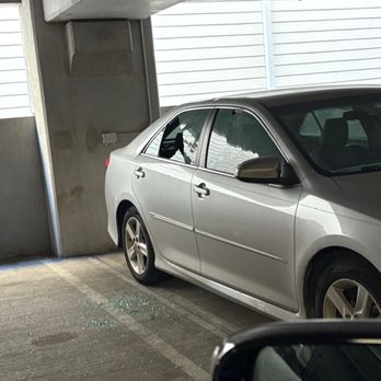 The Sevens - Broken car window garage - Apartments Near Me - Dallas, Texas The Sevens - Broken car window garage - Apartments Near Me - Dallas, Texas