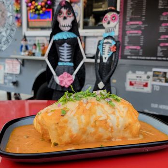 La Chingona Taqueria - Wet burrito -- comes as a vegetarian option as well - Food Trucks Near Me - Bellevue, Washington La Chingona Taqueria - Wet burrito -- comes as a vegetarian option as well - Food Trucks Near Me - Bellevue, Washington