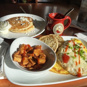Another Broken Egg Cafe - Lemon Blueberry Goat Cheese Pancakes The Floridian Omelette - Breakfast & Brunch Near Me - Clearwater Beach, Florida