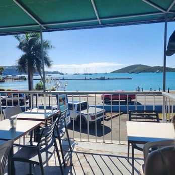 Bumpa's - View of bay from covered balcony. - Caribbean Near Me - Charlotte Amalie, Virgin Islands Bumpa's - View of bay from covered balcony. - Caribbean Near Me - Charlotte Amalie, Virgin Islands