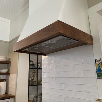 Dotzler Designs - Walnut vent hood trim out - Carpenters Near Me