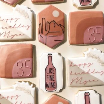Cookies & Moore - a bottle of wine on a table - Desserts Near Me