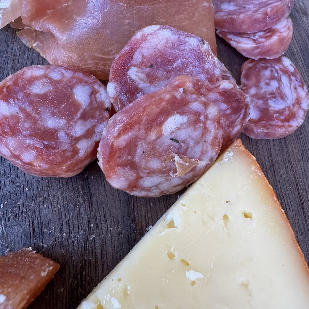 Barcelona Wine Bar - Charcuterie- manchengo, jamón sarano, and fuet salami - Tapas/Small Plates Near Me - Delray Beach, Florida