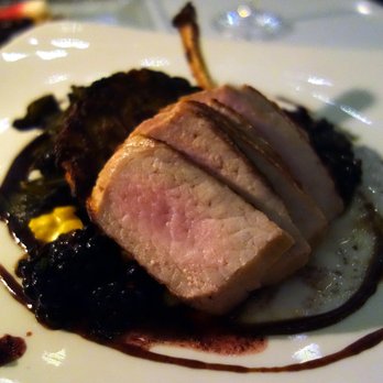 The Stonehouse Restaurant - Cider Brined Snake River Farms Pork Chop 54 Sweet Potato and Goat Cheese Rösti with Collard Greens Creamed Corn and Blackberry Port Sauce - New American Near Me - Santa Barbara, California The Stonehouse Restaurant - Cider Brined Snake River Farms Pork Chop 54 Sweet Potato and Goat Cheese Rösti with Collard Greens Creamed Corn and Blackberry Port Sauce - New American Near Me - Santa Barbara, California