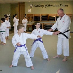 Shotokan Karate Leadership School - Young students learning correct form.