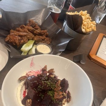 Bitter Sisters - Beet salad and Korean bbq wings. And the yummy Kimchi popcorn - Brewpubs Near Me - Calgary, Alberta