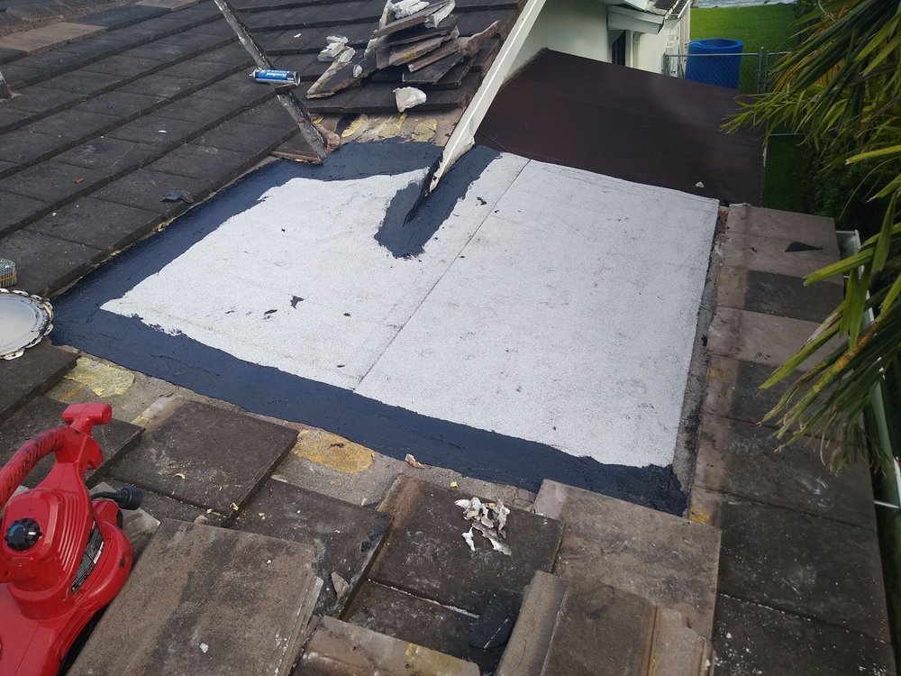 Slide of D-Tech Roofing