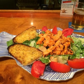 Sunset Grille - Buffalo Chicken Caesar salad - Sports Bars Near Me - Marco Island, Florida Sunset Grille - Buffalo Chicken Caesar salad - Sports Bars Near Me - Marco Island, Florida