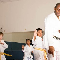Olympic Karate and Sports Center - Sensei Alex Ndem teaching kids shotokan karate martial arts class at Olympic Karate and Sports Center in southwest Houston.