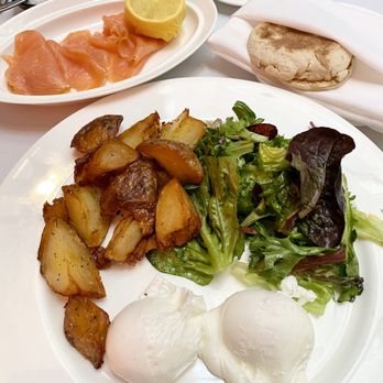 The Mark Restaurant - Eggs Benedict with roasted potatoes and smoked salmon - French Near Me - New York, New York