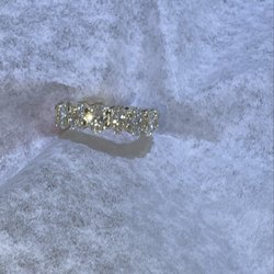 Dynasty Jewelers - Handcrafted in California, this luxurious eternity band features 16 brilliant diamonds totaling 8.23 carats set in rich 14K yellow gold