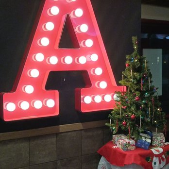 Arby's - a christmas tree in front of a lighted letter - Fast Food Near Me - Grayslake, Illinois