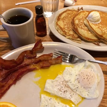 Cracker Barrel Old Country Store - Mamas pancake breakfast with over easy eggs and bacon. Total with coffee was about $9 - American Near Me - Melbourne, Florida Cracker Barrel Old Country Store - Mamas pancake breakfast with over easy eggs and bacon. Total with coffee was about $9 - American Near Me - Melbourne, Florida