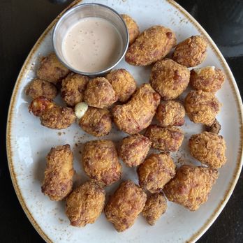 The Statehouse - FRIED CLOCKSHADOW CHEESE CURDS - spicy ranch sauce - New American Near Me - Madison, Wisconsin