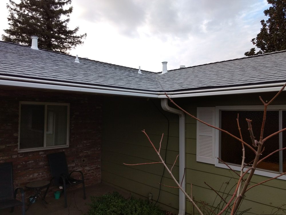 Slide of All American Roofing