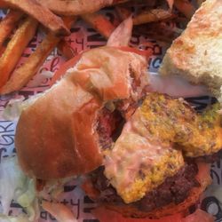 A single MOOYAH Cheeseburger with Hand Personal Hand-Cut Fries