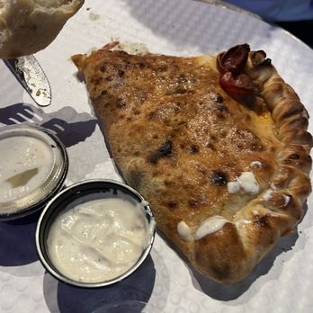 The Rock Yard Kitchen & Bar - Calzone Huge!! - Pizza Near Me - Trenton, Texas