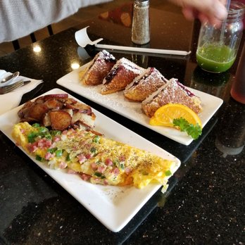 Keke's Breakfast Cafe - Blueberry stuffed French toast and a western style omelette with home fries - Breakfast & Brunch Near Me - Winter Park, Florida Keke's Breakfast Cafe - Blueberry stuffed French toast and a western style omelette with home fries - Breakfast & Brunch Near Me - Winter Park, Florida