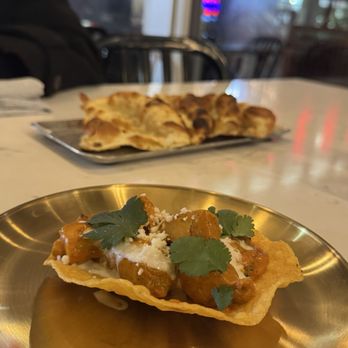 Turmeric & - Butter Chicken Tostada - Indian Near Me - Nashville, Tennessee Turmeric & - Butter Chicken Tostada - Indian Near Me - Nashville, Tennessee