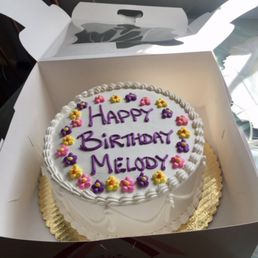 This is the 9 inch cake with the "hippy" flowers... my mom loved it! She ate every last bite.