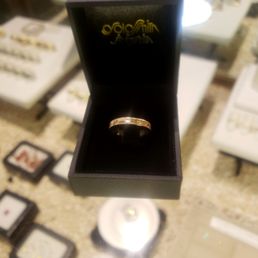 Goldsmith Silversmith made this beautiful custom ring out of my grandmother's hoop earring and gold from other sentimental jewelry pieces. Goldsmith Silversmith made this beautiful custom ring out of my grandmother's hoop earring and gold from other sentimental jewelry pieces.