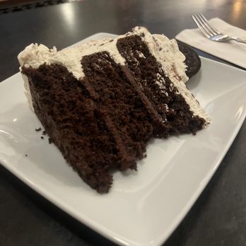 Downtown Bistro 108 - a slice of chocolate cake - American Near Me - Watertown, New York Downtown Bistro 108 - a slice of chocolate cake - American Near Me - Watertown, New York