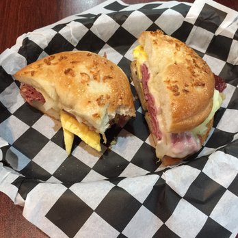 Biderman's Deli - Corned Beef Scramble on garlic bagel ($6). - Delis Near Me - Austin, Texas