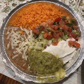 Sol De Mexico - Pico de gallo, sour cream, lettuce, refried beans & spanish rice served with the fajitas - Mexican Near Me - Carlinville, Illinois Sol De Mexico - Pico de gallo, sour cream, lettuce, refried beans & spanish rice served with the fajitas - Mexican Near Me - Carlinville, Illinois