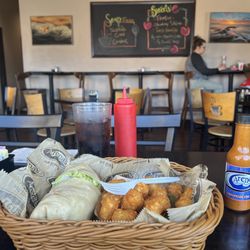 Arena's - Monterey Jack grilled chicken wrap with tots.