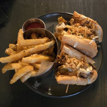 The Stubborn Mule - Chipotle cheesesteak and rosemary parm fries - New American Near Me - Orlando, Florida The Stubborn Mule - Chipotle cheesesteak and rosemary parm fries - New American Near Me - Orlando, Florida