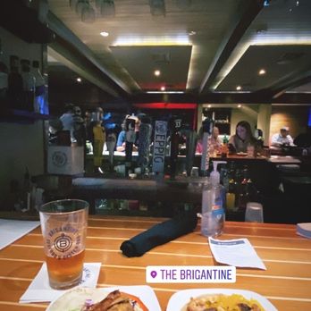 Brigantine - Mahi mahi taco on the left  Surf and turf taco on the right  Latitude 33 beer in the back!  Happy hour from 4-6 pm on weekdays! - Seafood Near Me - Del Mar, California