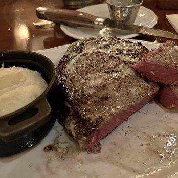 Le Cellier Steakhouse - Digging in. Mine was cooked Rare, as requested. - Steakhouses Near Me - Orlando, Florida Le Cellier Steakhouse - Digging in. Mine was cooked Rare, as requested. - Steakhouses Near Me - Orlando, Florida