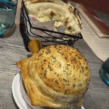 Cali Chilli - Paneer chilli pot pie and Garlic Naan - Indian Near Me - Long Beach, California Cali Chilli - Paneer chilli pot pie and Garlic Naan - Indian Near Me - Long Beach, California