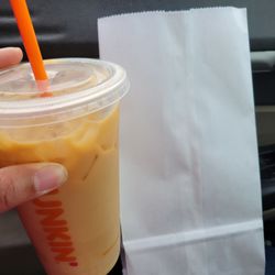 Caramel ice coffee with boston cream donut