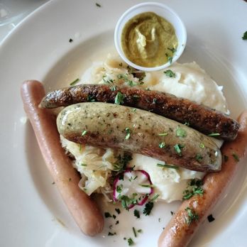Hofbräuhaus Buffalo - Wurst platter, with sauerkraut and mashed potatoes. - Beer Gardens Near Me - Buffalo, New York Hofbräuhaus Buffalo - Wurst platter, with sauerkraut and mashed potatoes. - Beer Gardens Near Me - Buffalo, New York