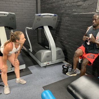 Built By Abs - Teaching the single leg eccentric wall sit - Trainers Near Me - San Diego, California Built By Abs - Teaching the single leg eccentric wall sit - Trainers Near Me - San Diego, California
