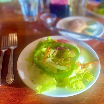 The Jefferson Restaurant - a plate of salad and a fork - Barbeque Near Me - Williamsburg, Virginia