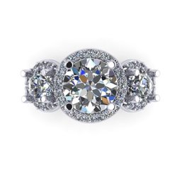 Estate Buying Group - Harry H Solomon Co - An ideal way to jazz up the traditional three stone ring.