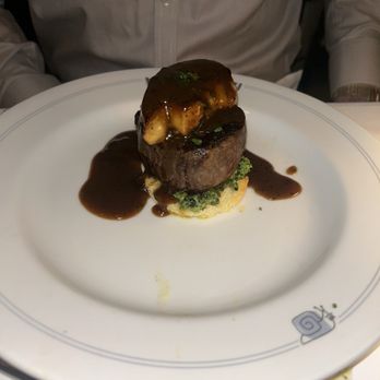Mon Ami Gabi - special of the night: crostini with spinach, topped with filet, foie gras, & truffle sauce - French Near Me - Chicago, Illinois Mon Ami Gabi - special of the night: crostini with spinach, topped with filet, foie gras, & truffle sauce - French Near Me - Chicago, Illinois