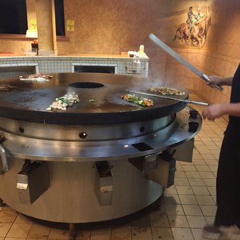 Ghengis Khan Mongolian Barbecue - Moses whipping up some good eats! - Buffets Near Me - Midland, Michigan Ghengis Khan Mongolian Barbecue - Moses whipping up some good eats! - Buffets Near Me - Midland, Michigan