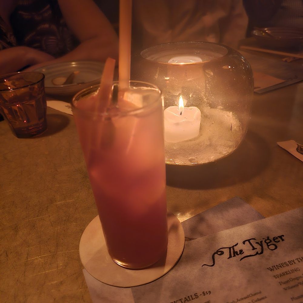 The Tyger - Fiery Forge- Pathfinder hemp spirit, Lyre's Italian orange, pineapple, five spice, and pomelo soda. $14. Good - Cocktail Bars Near Me - New York, New York The Tyger - Fiery Forge- Pathfinder hemp spirit, Lyre's Italian orange, pineapple, five spice, and pomelo soda. $14. Good - Cocktail Bars Near Me - New York, New York