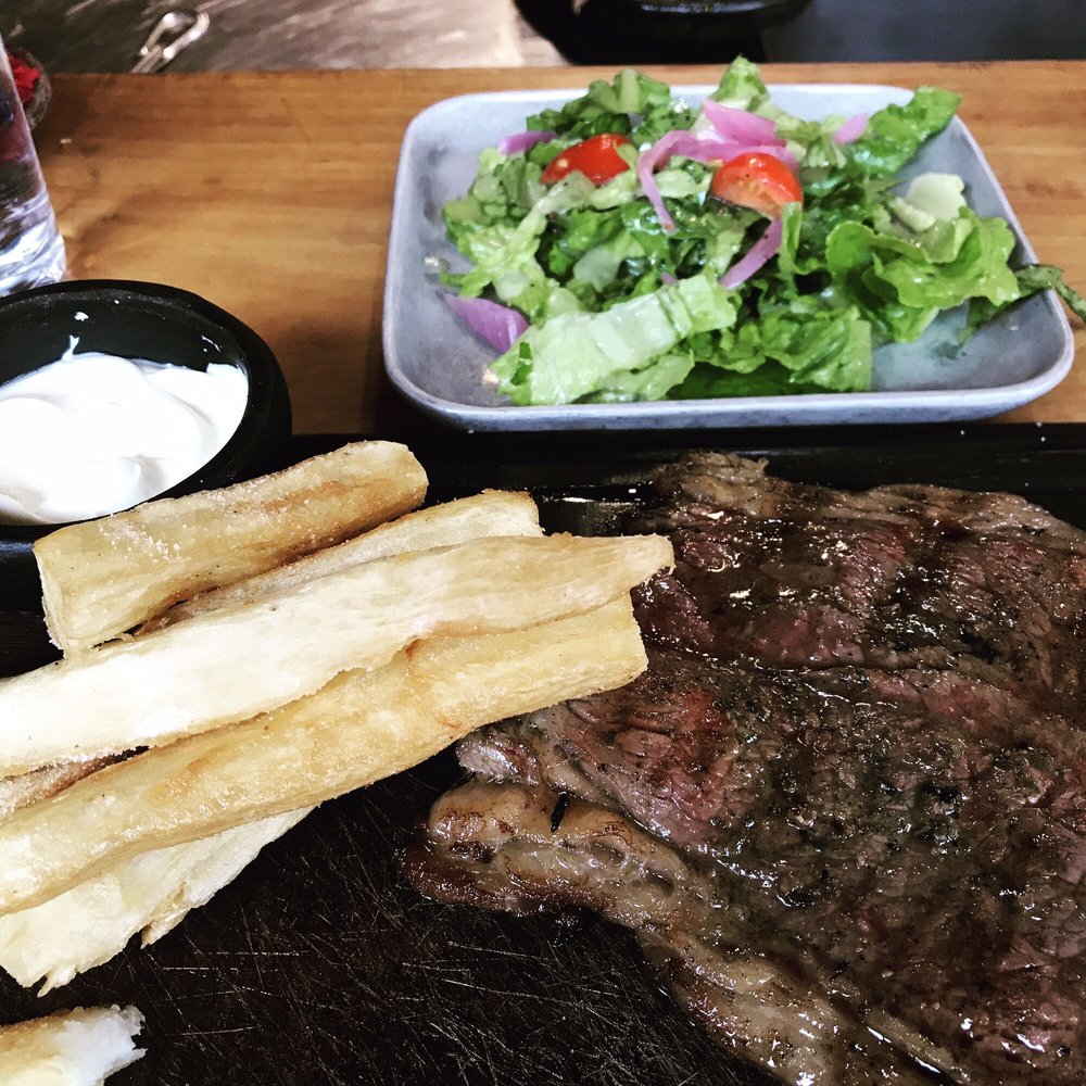 El Humero - Steak with yuca wedges and Colombian sour cream, also comes with a great garden salad - Latin American Near Me - Auckland, AUK El Humero - Steak with yuca wedges and Colombian sour cream, also comes with a great garden salad - Latin American Near Me - Auckland, AUK