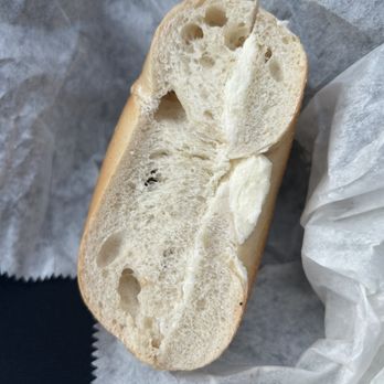 Bagel Bazaar - a piece of bread on a piece of paper - Bagels Near Me - North Brunswick, New Jersey