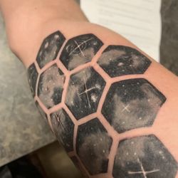 Dark Horse Tattoos - Galaxy honeycomb tattoo.