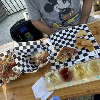 Ponderosa Cider - Delightful flight and great food provided by Vegan Circus. - Cideries Near Me - Auburn, California Ponderosa Cider - Delightful flight and great food provided by Vegan Circus. - Cideries Near Me - Auburn, California